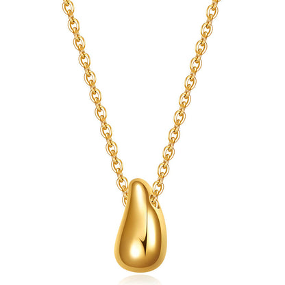 Gold necklace with a teardrop-shaped pendant on a white background